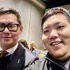 Young Joo Sun and Ben Ng, a former lab member, catch up at ARVO 2024.