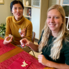 At the 2023 lab holiday party, Soo Hyeon and Ditte enthusiastically participate in traditional holiday cookie decorating.