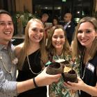 Gabe, Kellie, MaryAnn, and Katie coconut toast at the 2017 Byer's Eye Institute Holiday Party